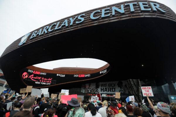 Protesters rally at the Barclays Center in the Brooklyn borough of New York on May 29, 2020. (AP Photo/Frank Franklin II)
