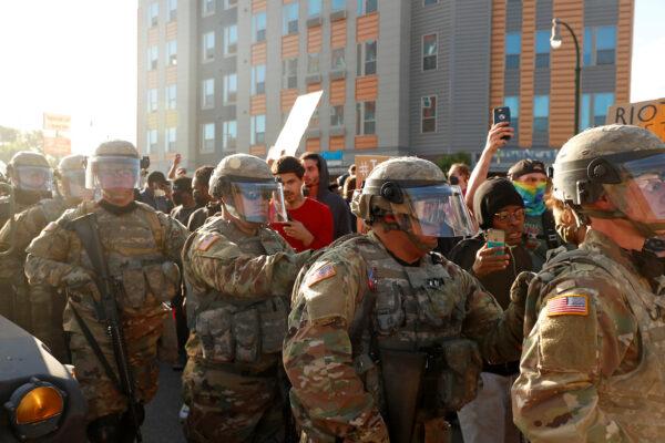 National Guard members are seen near protesters in Minneapolis, Minnesota, on May 29, 2020. (Lucas Jackson/Reuters)