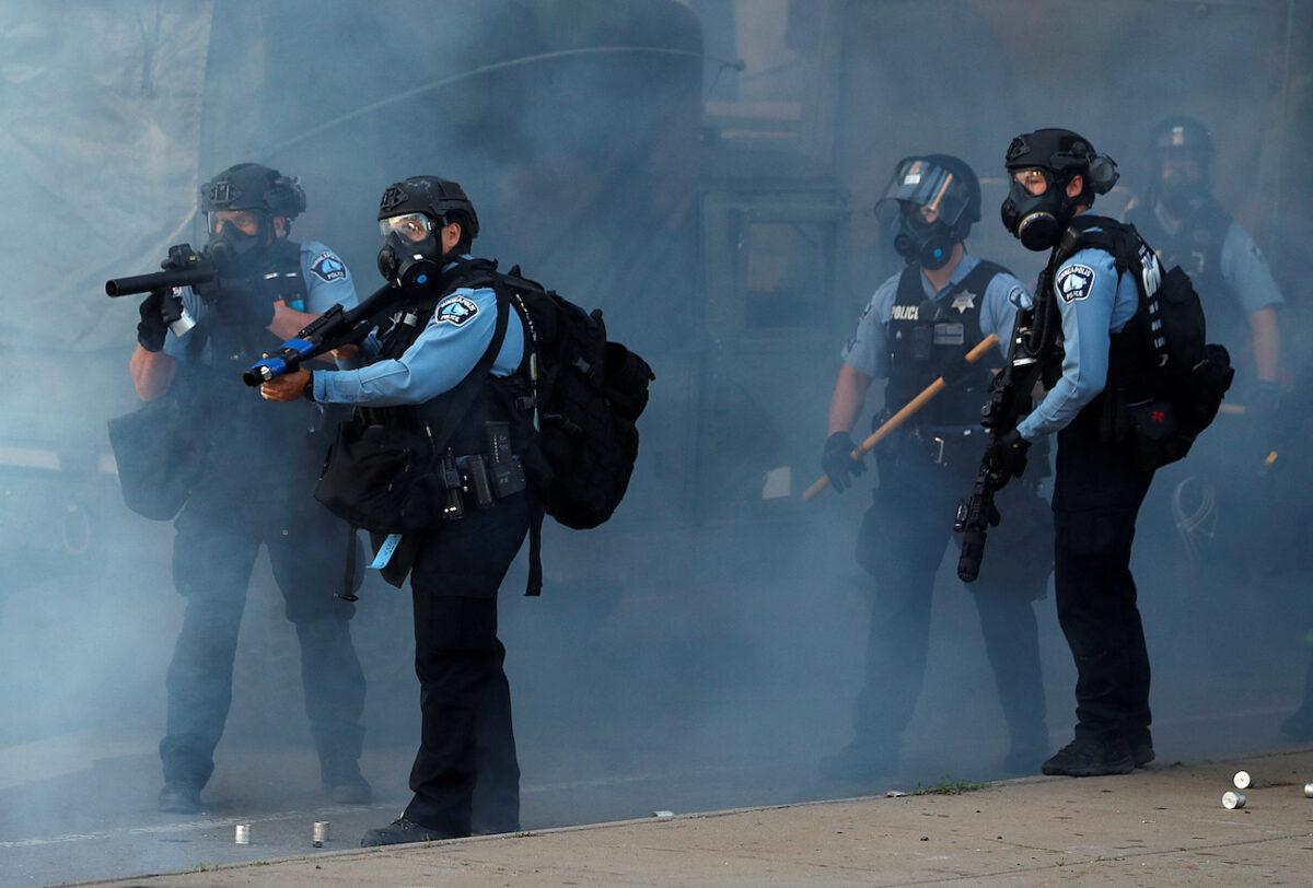 Police officers are seen during a protest in Minneapolis, Minn., on May 29, 2020. (Lucas Jackson/Reuters)