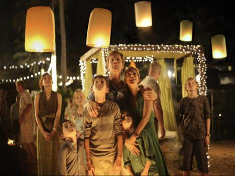 A family on vacation: (center, L–R) Oaklee Pendergast, Tom Holland, Ewan McGregor, Samuel Joslin, and Naomi Watts, in “The Impossible.” (Warner Bros. Pictures)