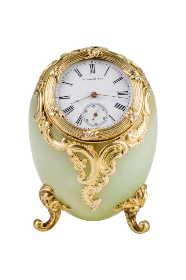 Egg-shaped desk clock, before 1903, by the firm of Fabergé, workmaster Mikhail Perkhin. St. Petersburg, Russia. Bowenite, gilded silver, enamel. Private collection, New York, N.Y. (Museum of Russian Icons)