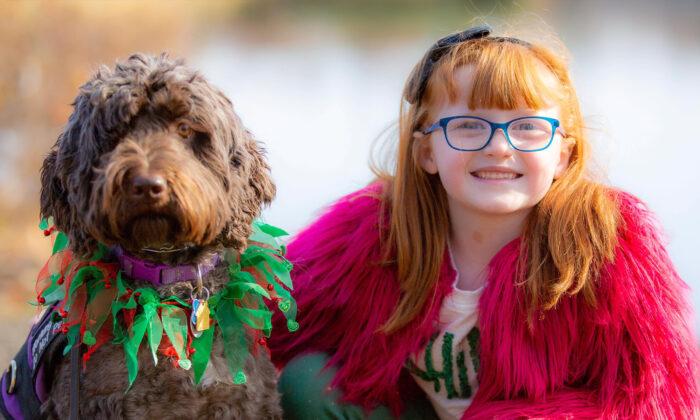 School Surprises 7-Year-Old With a Photo of Her Life-Saving Service Dog in the Yearbook