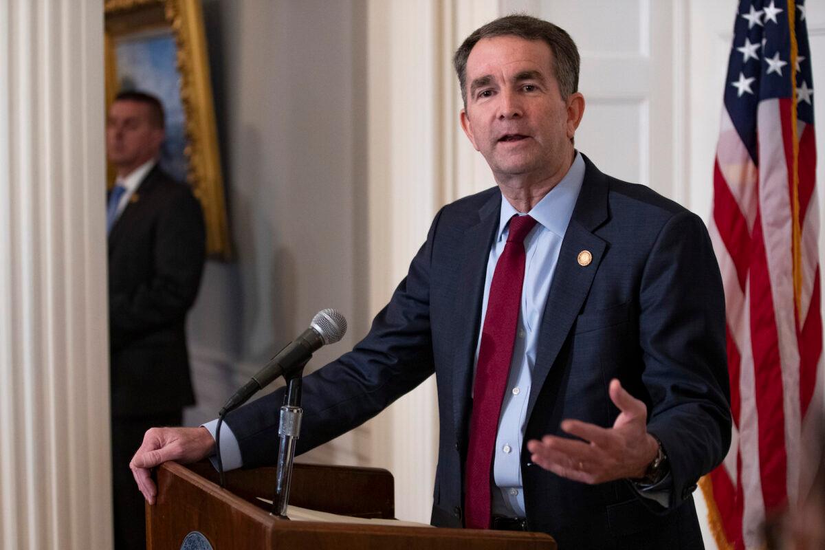 Virginia Gov. Ralph Northam gestures during a news conference at the Capitol in Richmond, Va., on April 8, 2020. (Steve Helber/AP Photo)