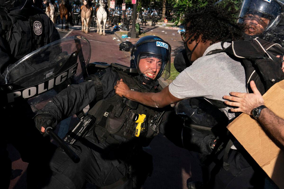 Police clash with protesters during a demonstration in Washington, on June 1, 2020. (Joshua Roberts/Getty Images)