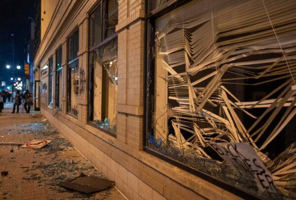  Damage is pictured to the Secretary of State building in downtown Grand Rapids, Mich., on May 30, 2020. (Anntaninna Biondo/The Grand Rapids Press via AP)