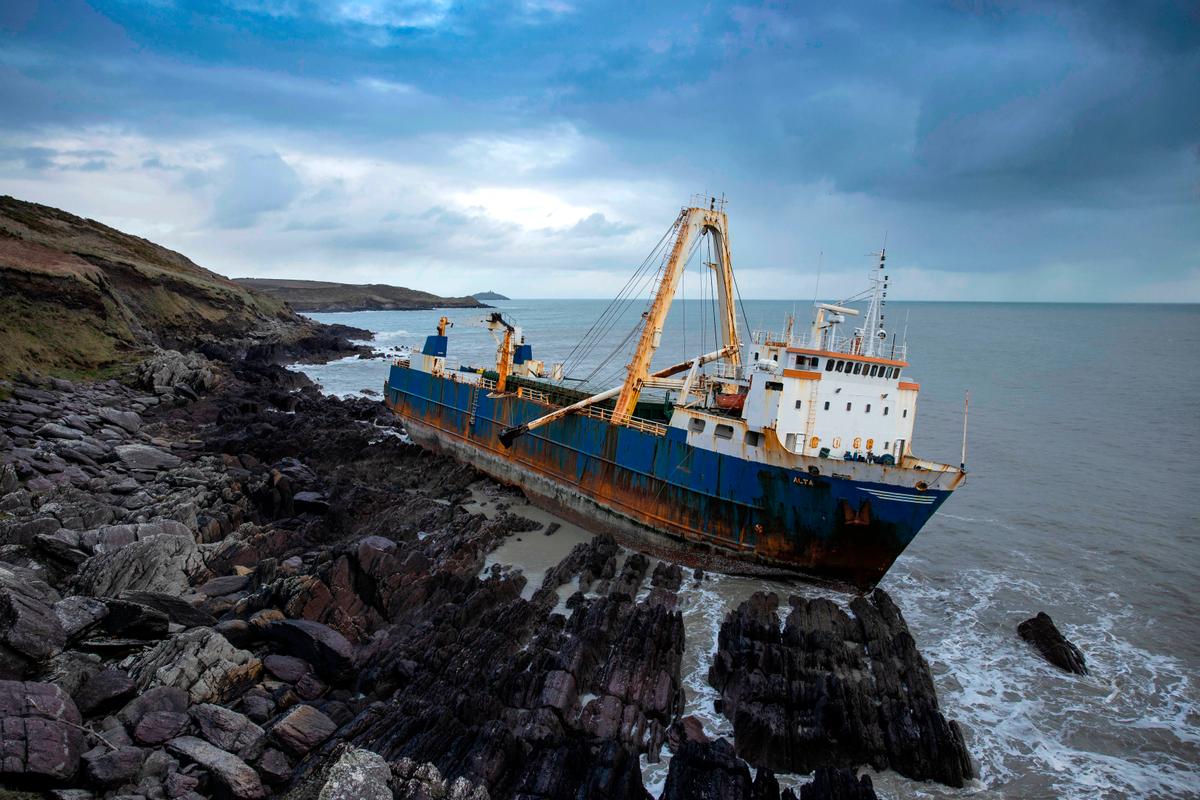 MV Alta "ghost ship" stuck on rocks near the village of Ballycotton southeast of Cork in Southern Ireland on Feb. 18, 2020. (CATHAL NOONAN/AFP via Getty Images)