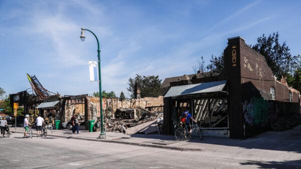 A row of four small businesses is destroyed during five nights of protests and violence following the death of George Floyd, in Minneapolis, Minn., on May 30, 2020. (Charlotte Cuthbertson/The Epoch Times)