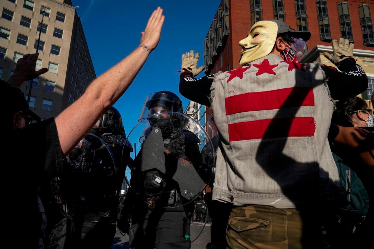 Demonstrators confront law enforcement during a protest in downtown Washington on June 1, 2020. (Drew Angerer/Getty Images)