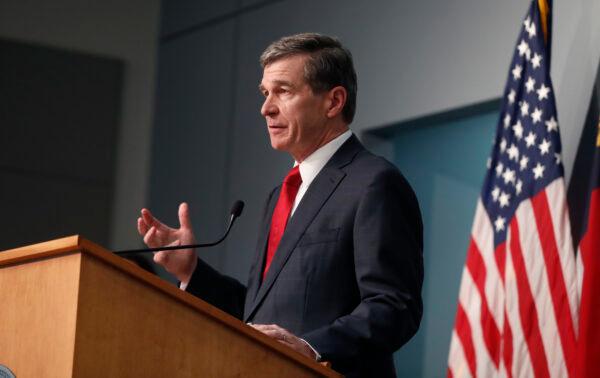 North Carolina Gov. Roy Cooper speaks during a briefing at the Emergency Operations Center in Raleigh, N.C., on June 2, 2020. (Ethan Hyman/The News & Observer via AP)