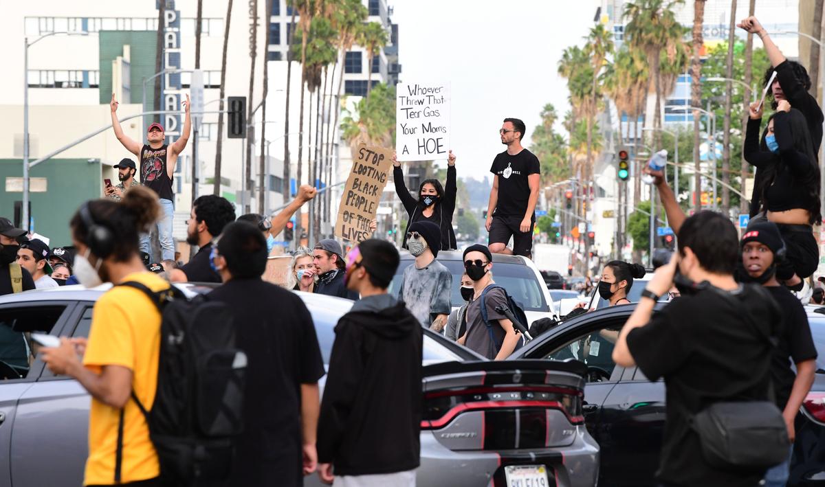 Protesters rally from their vehicles along Sunset Boulevard during a demonstration over the death of George Floyd in Hollywood, Calif., on June 2, 2020. (Frederic J. Brown/AFP via Getty Images)