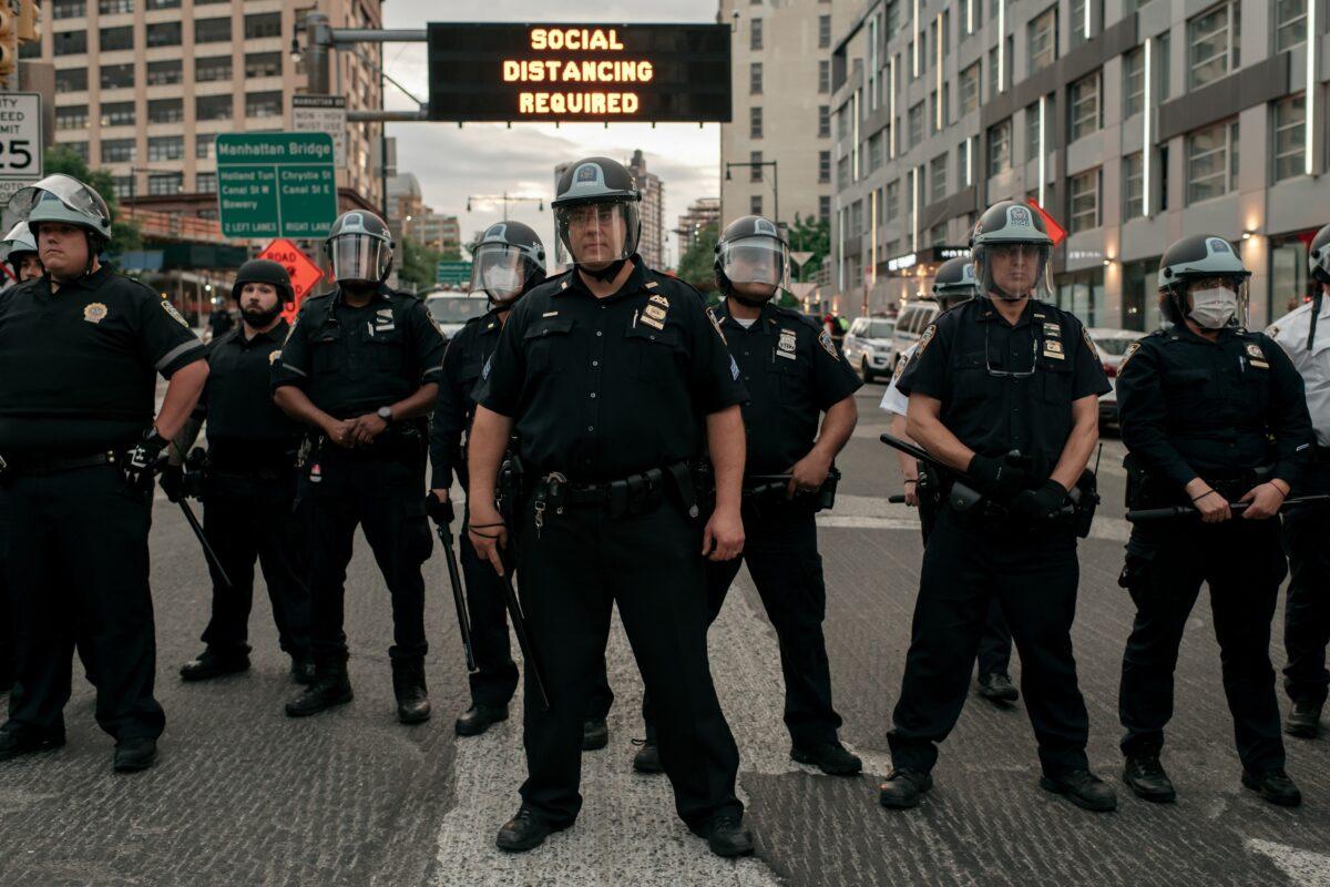 NYPD officers block the entrance of the Manhattan Bridge in New York, N.Y. on June 2, 2020. (Scott Heins/Getty Images)
