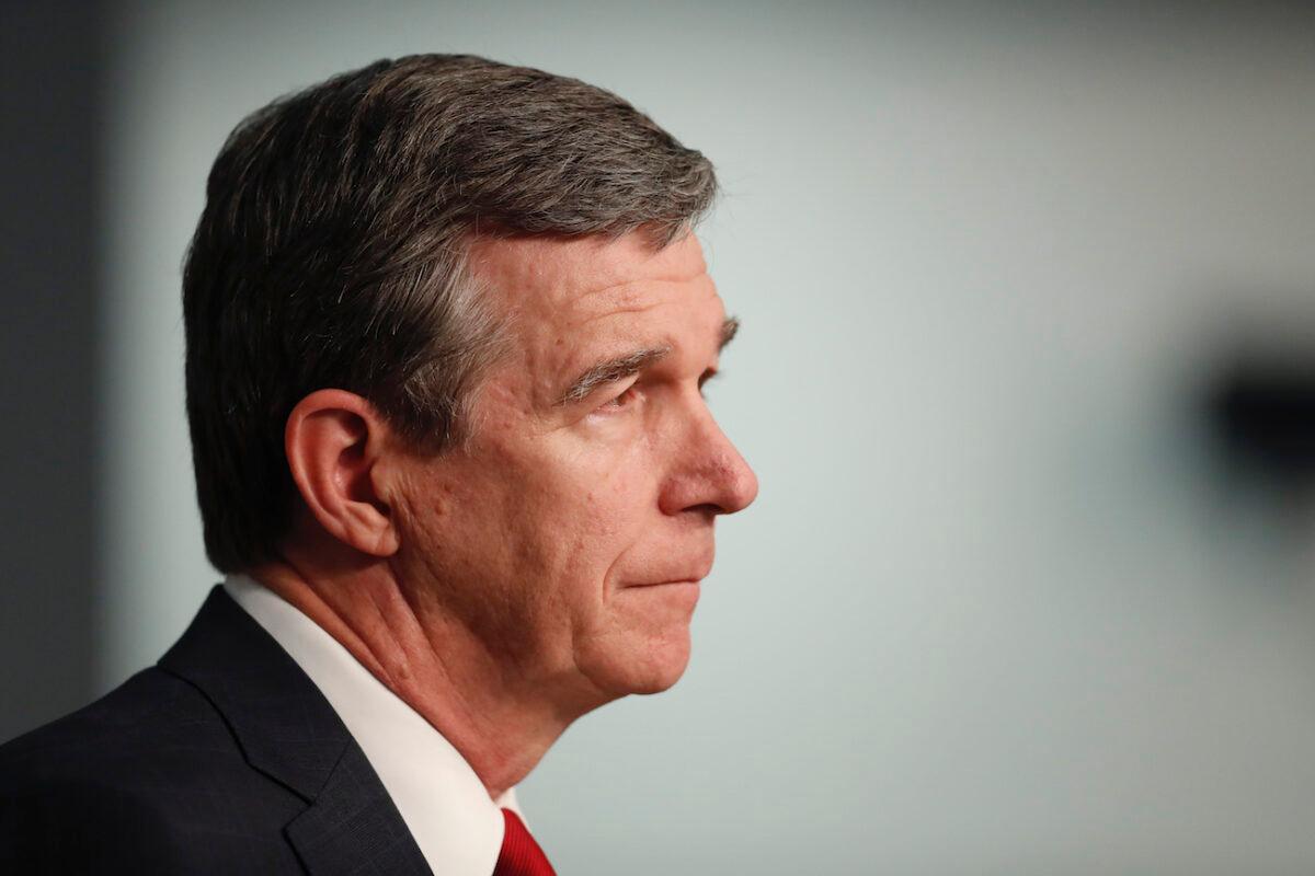 North Carolina Gov. Roy Cooper speaks during a briefing at the Emergency Operations Center in Raleigh, N.C., on June 2, 2020. (Ethan Hyman/The News & Observer via AP)