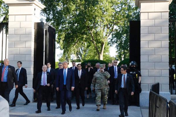 President Donald Trump walks from the gates of the White House to visit St. John's Church across Lafayette Park, in Washington, June 1, 2020. (AP Photo/Patrick Semansky)