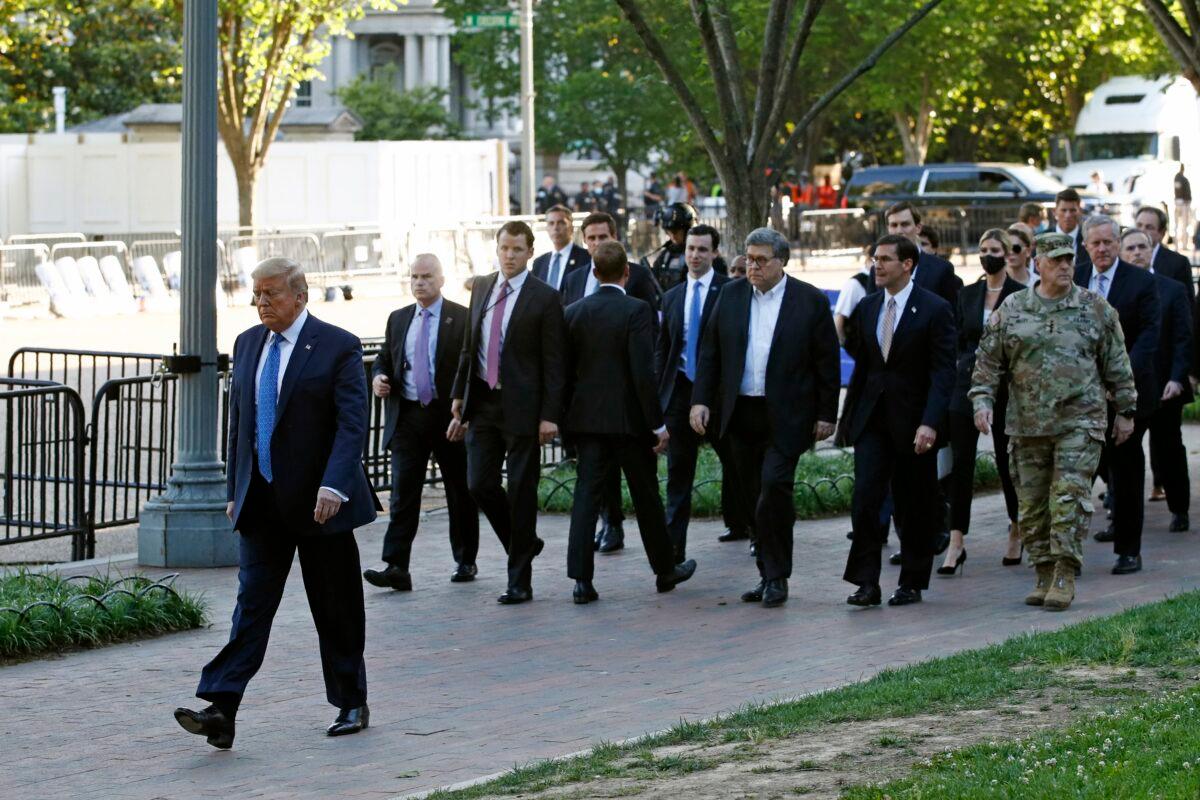 President Donald Trump walks in Lafayette Park to visit outside St. John's Church across from the White House in Washington on June 1, 2020. Part of the church was set on fire during riots on Sunday night. (Patrick Semansky/AP Photo)