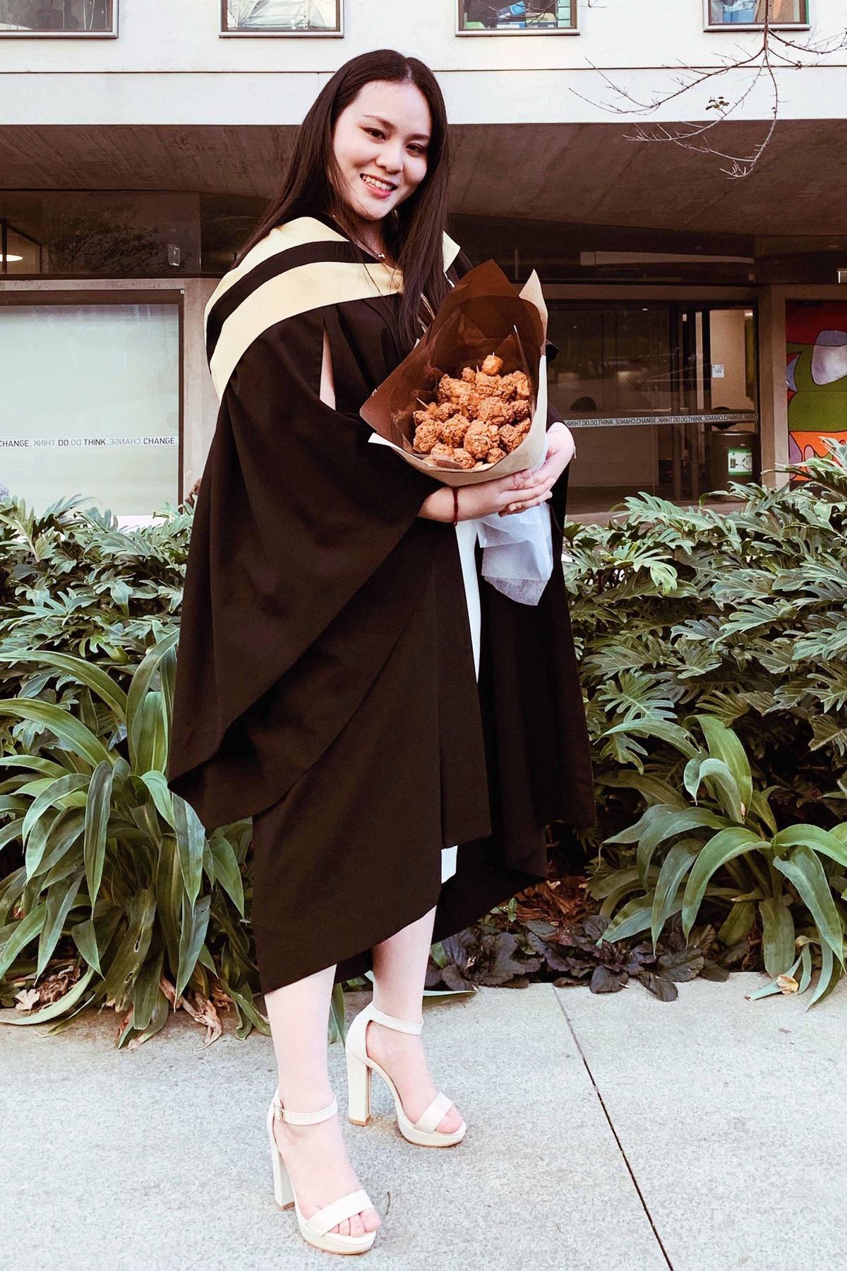 Lucy Zhao, 22, from Sydney, New South Wales, Australia, with her deep-fried "bouquet" (Caters News)