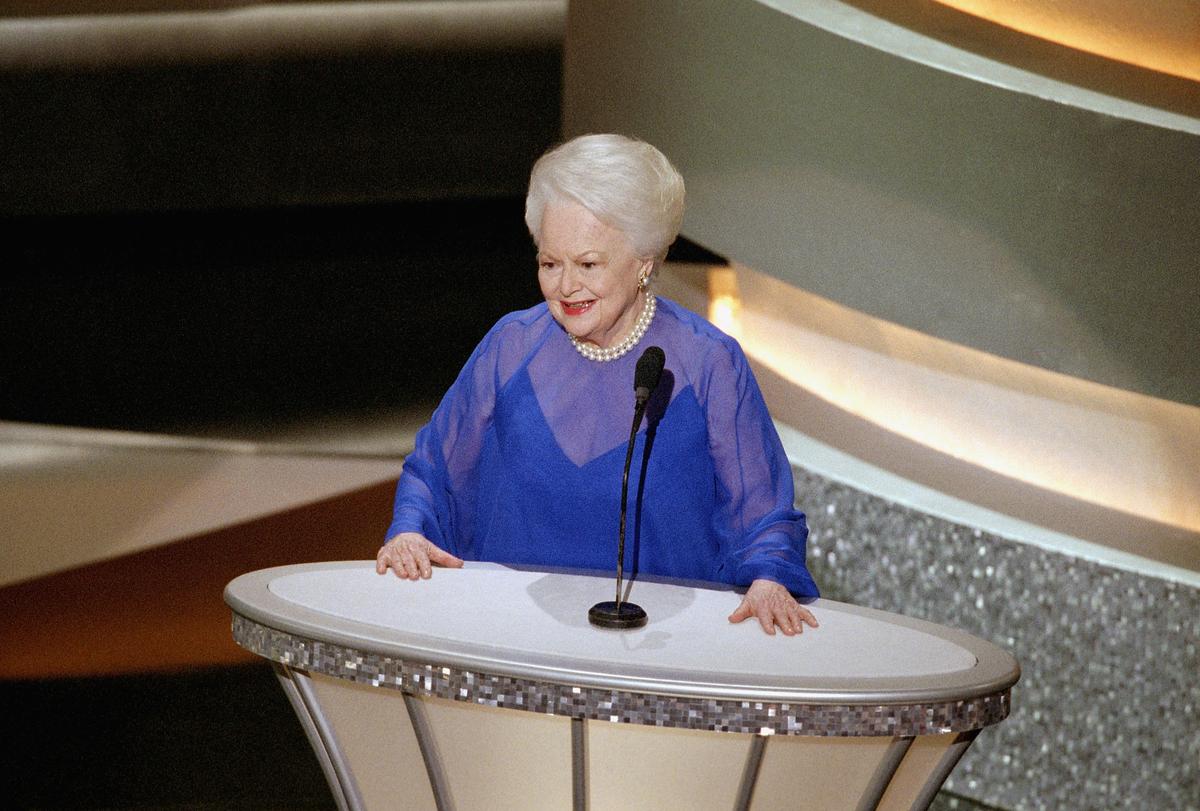 Olivia de Havilland introduces former winners during the 75th Annual Academy Awards at the Kodak Theater in Hollywood, California, on March 23, 2003. (A.M.P.A.S. via Getty Images)