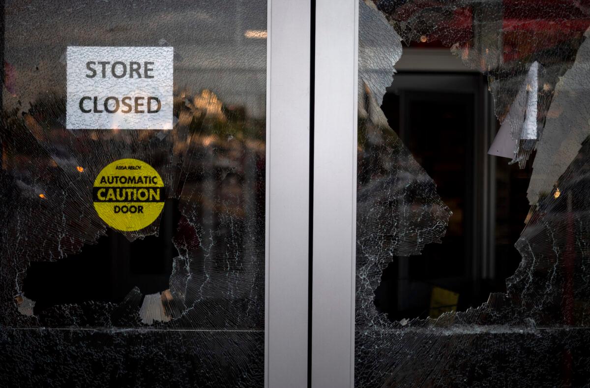 A view inside a Target store through a broken window in Minneapolis, Minn., on May 27, 2020. (Stephen Maturen/Getty Images)