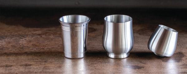 Danforth Pewter's specialist barware (L–R) Julep cup, Abbey cup, and tumbler. (Danforth Pewter)