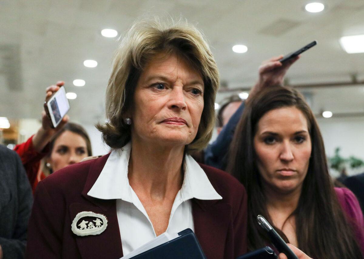 Sen. Lisa Murkowski (R-Alaska) walks through the Senate subway area during a break in impeachment proceedings, in the Capitol in Washington on Jan. 28, 2020. (Charlotte Cuthbertson/The Epoch Times)