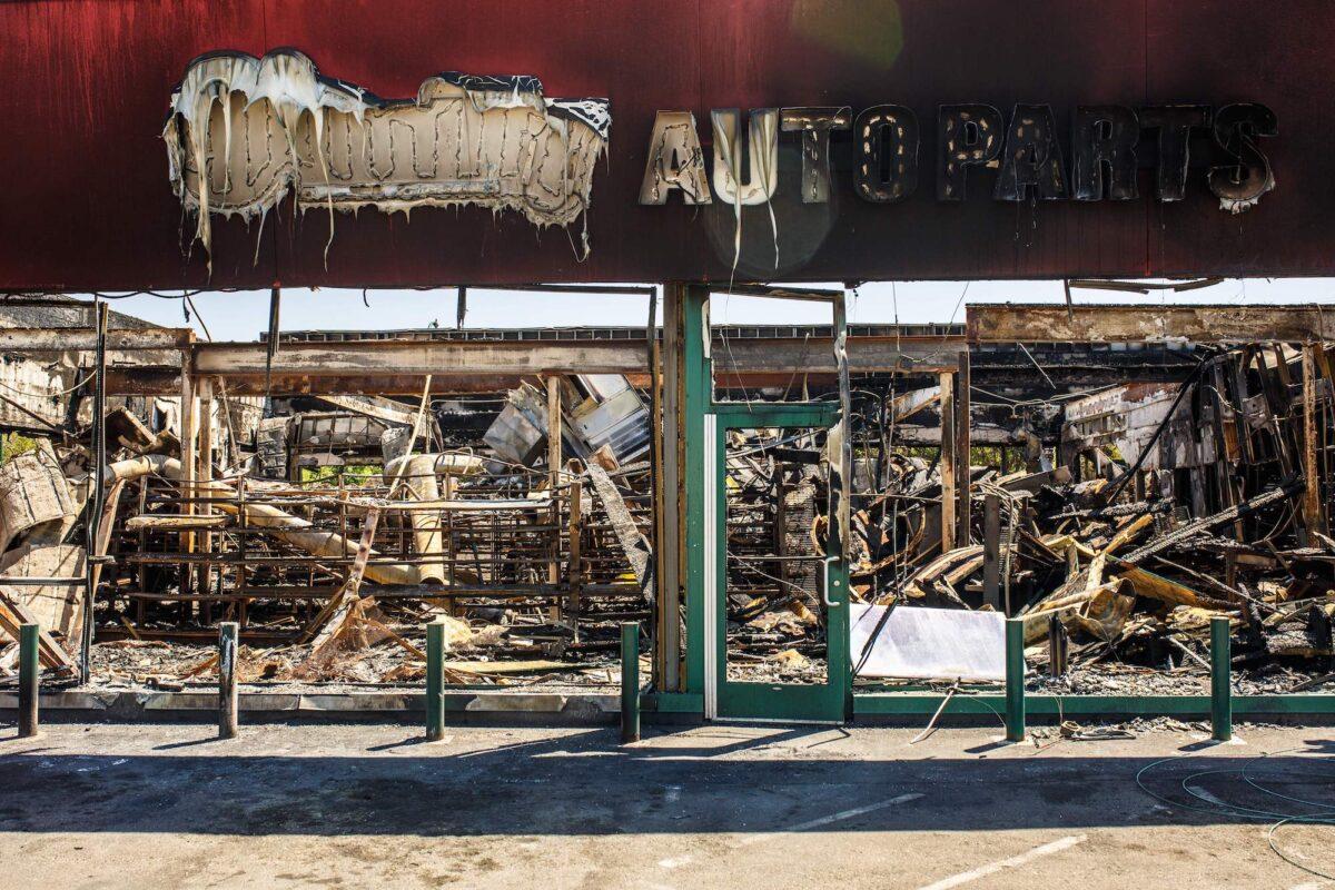 The charred wreckage of an auto parts store destroyed during last week's rioting, in Minneapolis, Minn., on June 3, 2020. (Kerem Yucel/AFP/Getty Images)