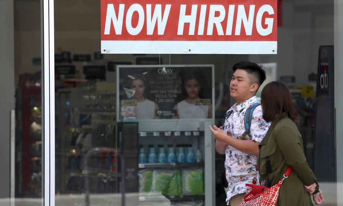 A now hiring sign is posted in the window of a CVS store in San Francisco, Calif., on June 7, 2019. (Justin Sullivan/Getty Images)