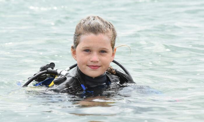 Courageous Schoolgirl Is the ‘Youngest in the World’ to Swim With Sharks Without a Cage