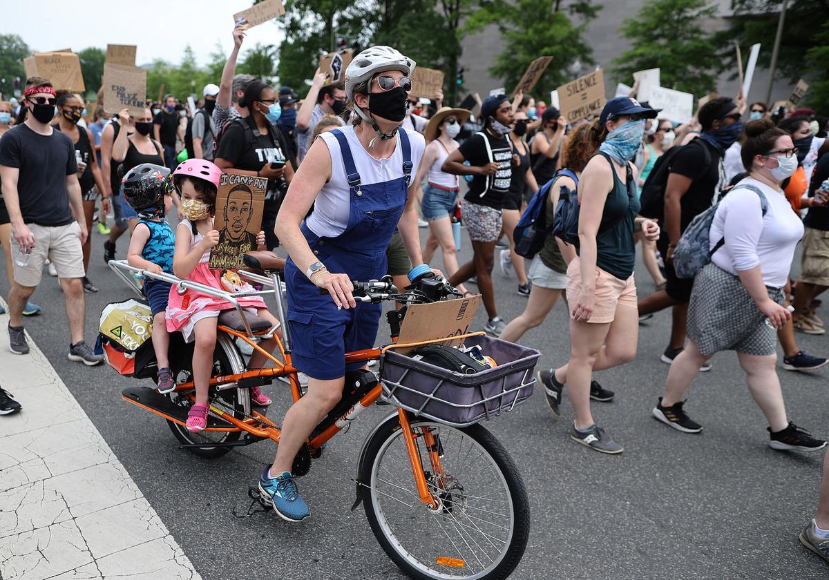Demonstrators march on Pennsylvania Avenue during a protest against police brutality and racism, in Washington on June 6, 2020. (Chip Somodevilla/Getty Images)