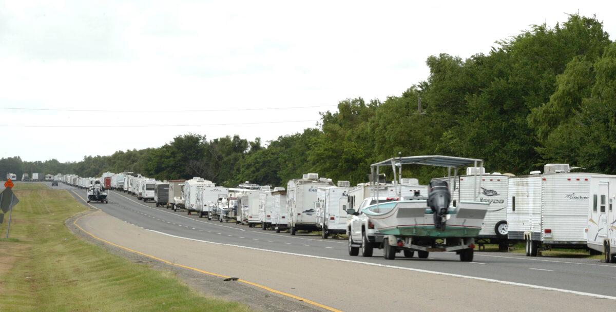 Recreational trailers and boats are parked along LA-46 inside the levee gates in anticipation of tropical storm Cristobal in St. Bernard Parish, La., on June 6, 2020. (Max Becherer/The Times-Picayune/The New Orleans Advocate)
