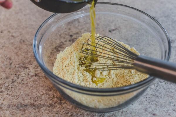 Whisk in warm water and olive oil. (Audrey Le Goff)