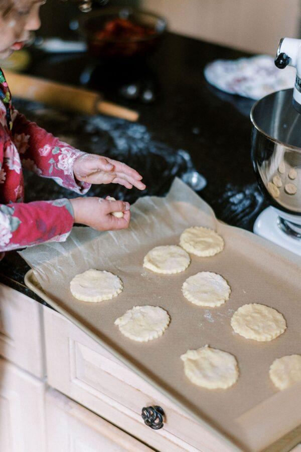 Prepping the biscuits to bake. (Matt Genders)