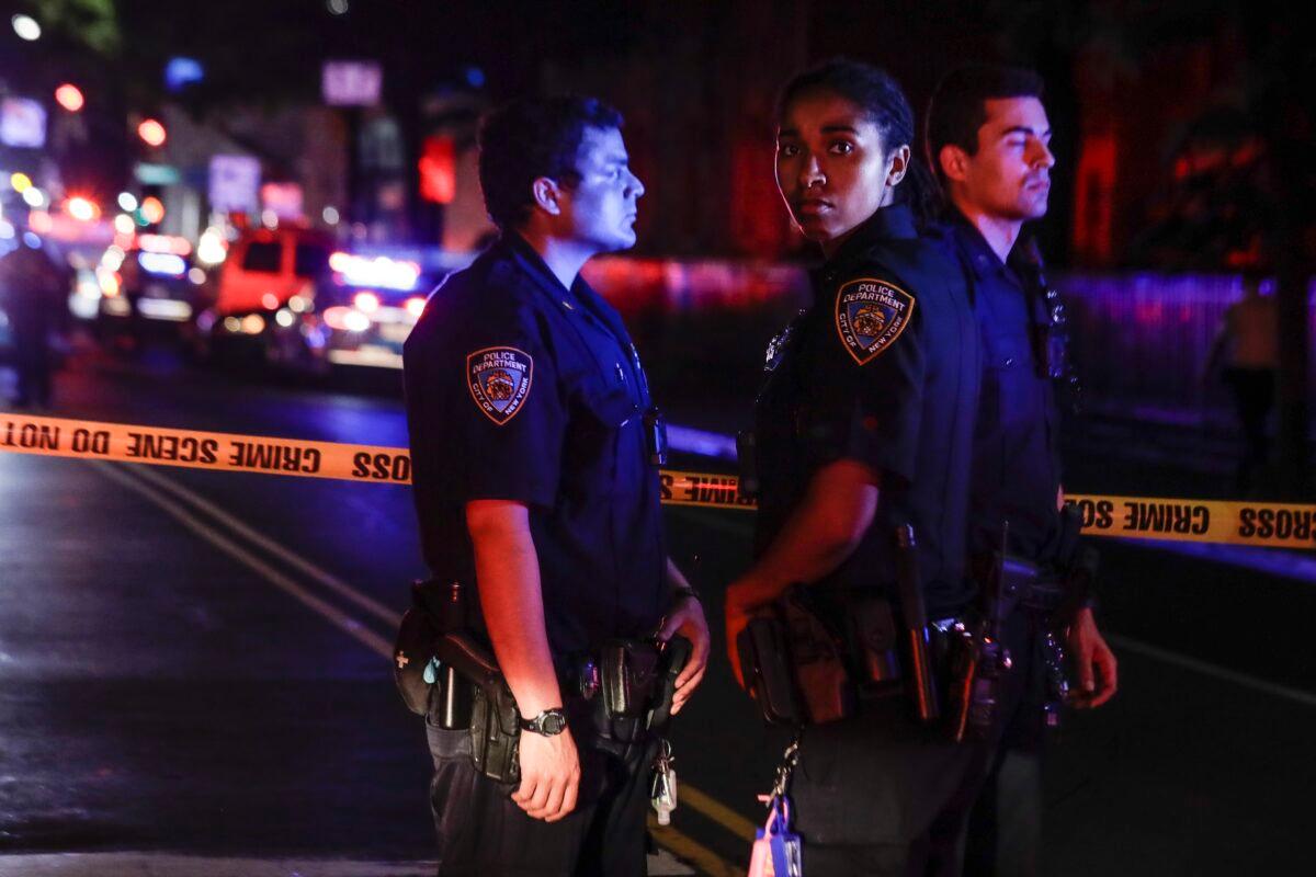 New York City police officers gather near the site of a shooting in Brooklyn on June 4, 2020. (Frank Franklin II/AP Photo)