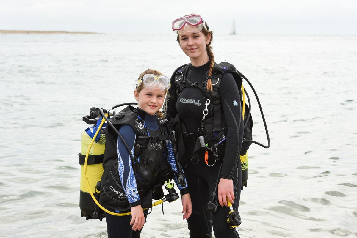 Amy and her sister, Charlotte Burns, from Biggin Hill, in their scuba diving kit. (Caters News)