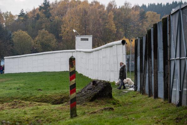 Border guard forces at a former fortified border crossing between East and West Germany during celebrations to mark the 30th anniversary of the fall of the Berlin Wall on Nov. 9, 2019 in Moedlareuth, Germany. (Jens Schlueter/Getty Images)