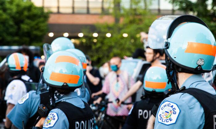 President of Chicago Police Board Says Police Struck Him With Batons During Protest