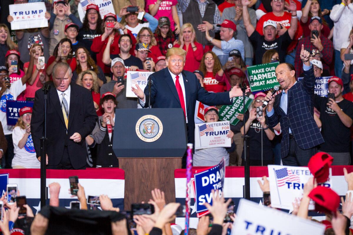 Rush Limbaugh (L) and singer Lee Greenwood (R) with President Donald Trump at a rally in Cape Girardeau, Mo., on Nov. 5, 2018. (Hu Chen/The Epoch Times)