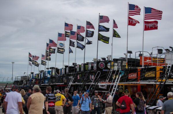 General view of American flags on NASCAR car haulers in the garage area during practice for the Ford EcoBoost 400 at Homestead-Miami Speedway, Homestead Florida, on Nov 17, 2018. (Mark J. Rebilas-USA TODAY Sports/File Photo via Reuters)