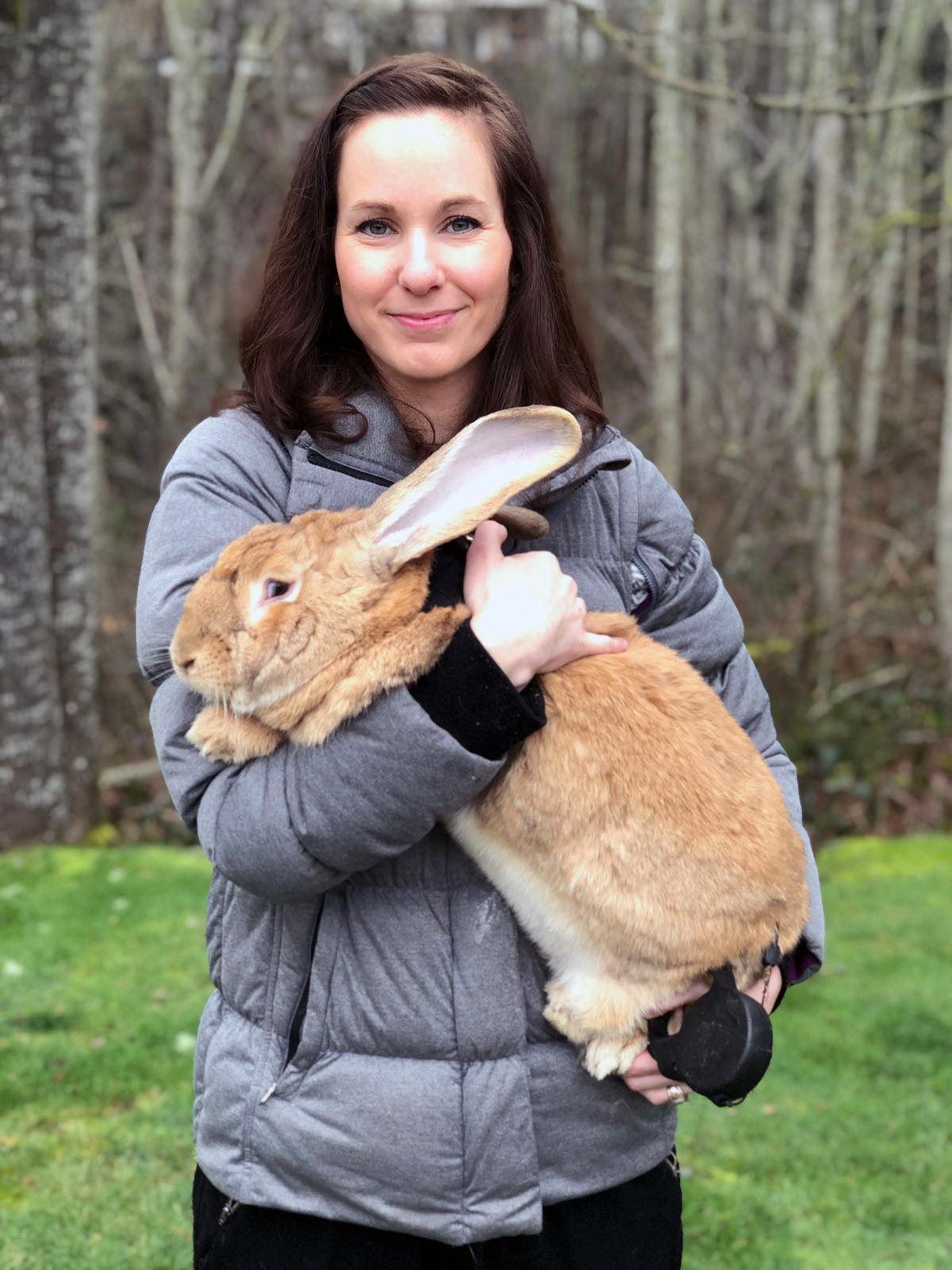Lindsay, 35, from Seattle, Washington, with Cocoa Puff the rabbit. (Caters News)