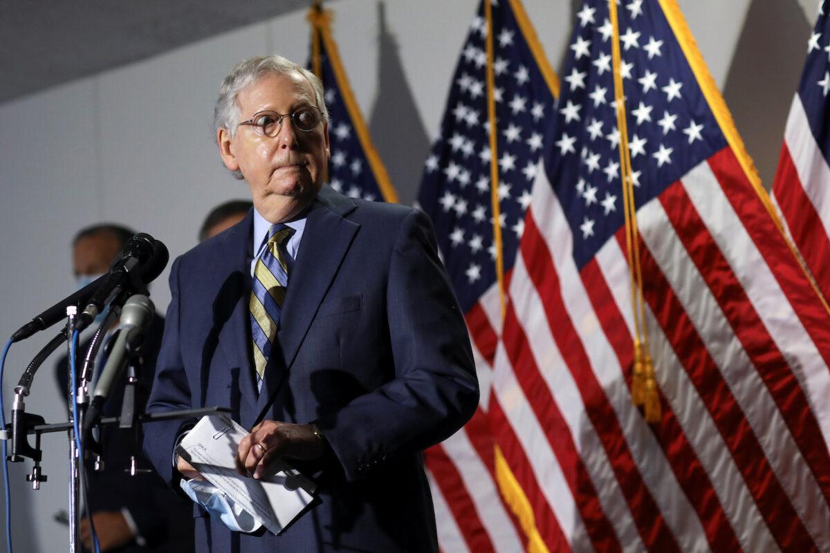 Senate Majority Leader Mitch McConnell (R-Ky.) speaks to reporters following the Senate Republicans weekly policy lunch on Capitol Hill in Washington on June 9, 2020. (Leah Millis/Reuters)