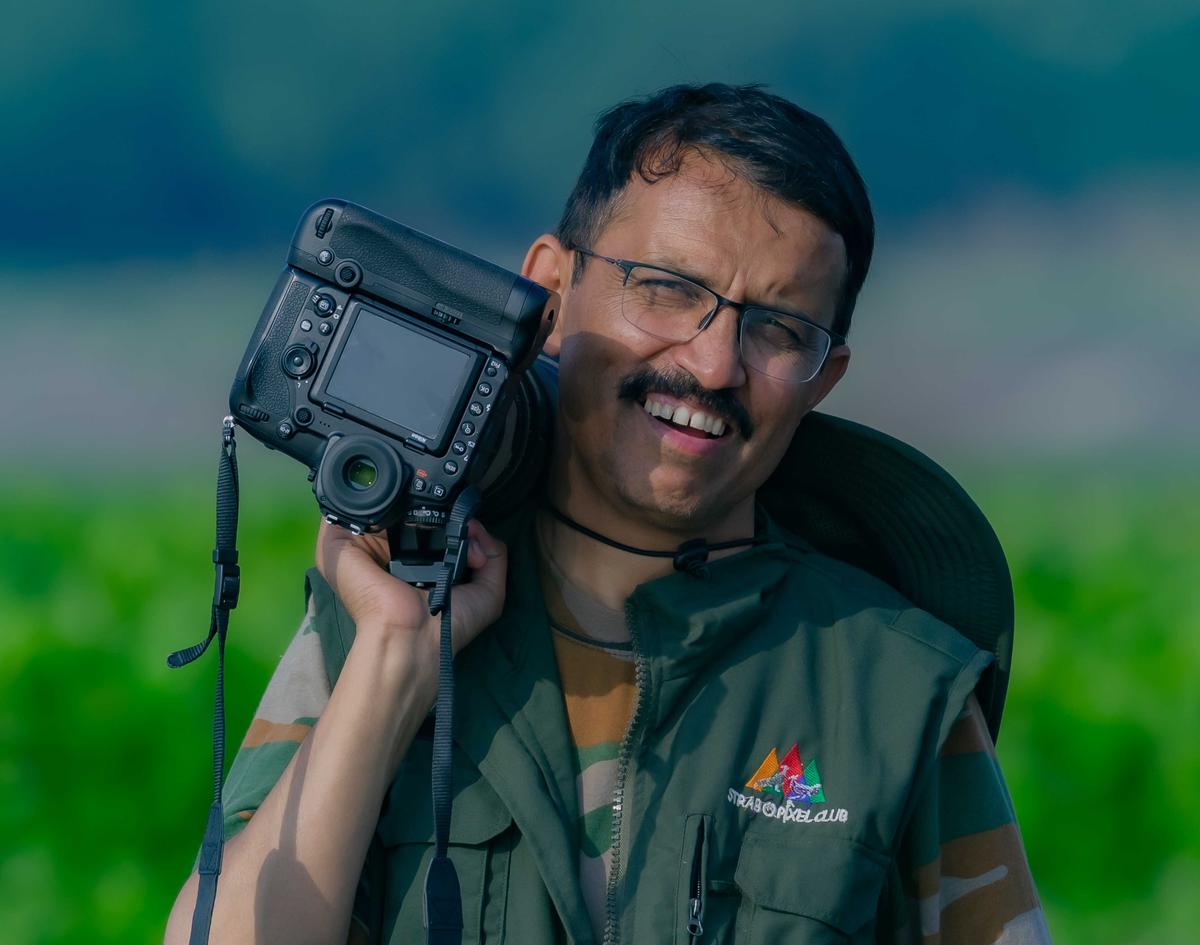 Photographer and Forest Department worker Prakash Badal, from Shimla, Himachal Pradesh, India (Caters News)