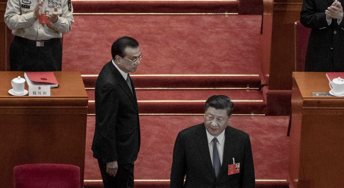 Chinese leader Xi Jinping and premier Li Keqiang arrived at the closing session of the Chinese Communist Party’s rubber stamp legislature’s congress in Beijing, China, on May 28, 2020. (Kevin Frayer/Getty Images)