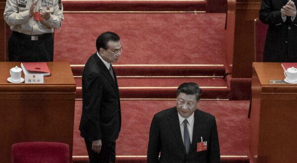 Chinese leader Xi Jinping and premier Li Keqiang arrived at the closing session of the party’s rubber stamp legislature’s congress in Beijing, China, on May 28, 2020. (Kevin Frayer/Getty Images)