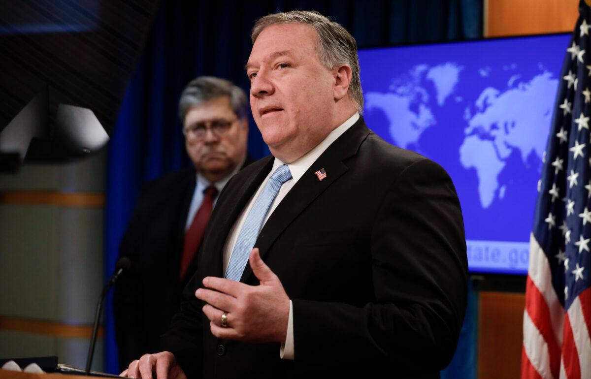 Secretary of State Mike Pompeo, right, holds a joint news conference on the International Criminal Court with Attorney General William Barr and other Cabinet officials at the State Department in Washington, on June 11, 2020. (Yuri Gripas/Pool/AFP via Getty Images)