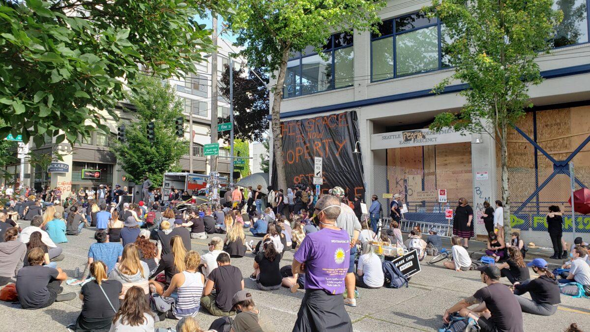 A group gathers in the Capitol Hill Autonomous Zone in Seattle, Wash., on June 10, 2020. (Ernie Li/NTD Television)