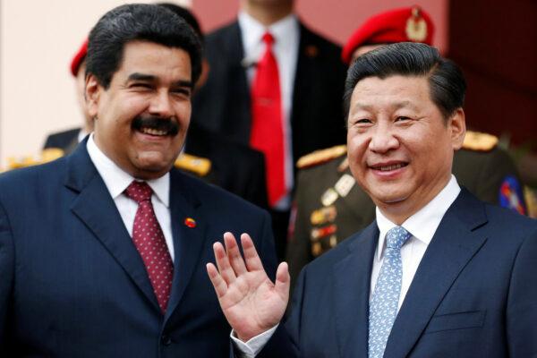China's leader Xi Jinping attends a meeting with Venezuelan President Nicolás Maduro at Miraflores Palace in Caracas, Venezuela, on July 20, 2014. (Reuters/Jorge Silva)