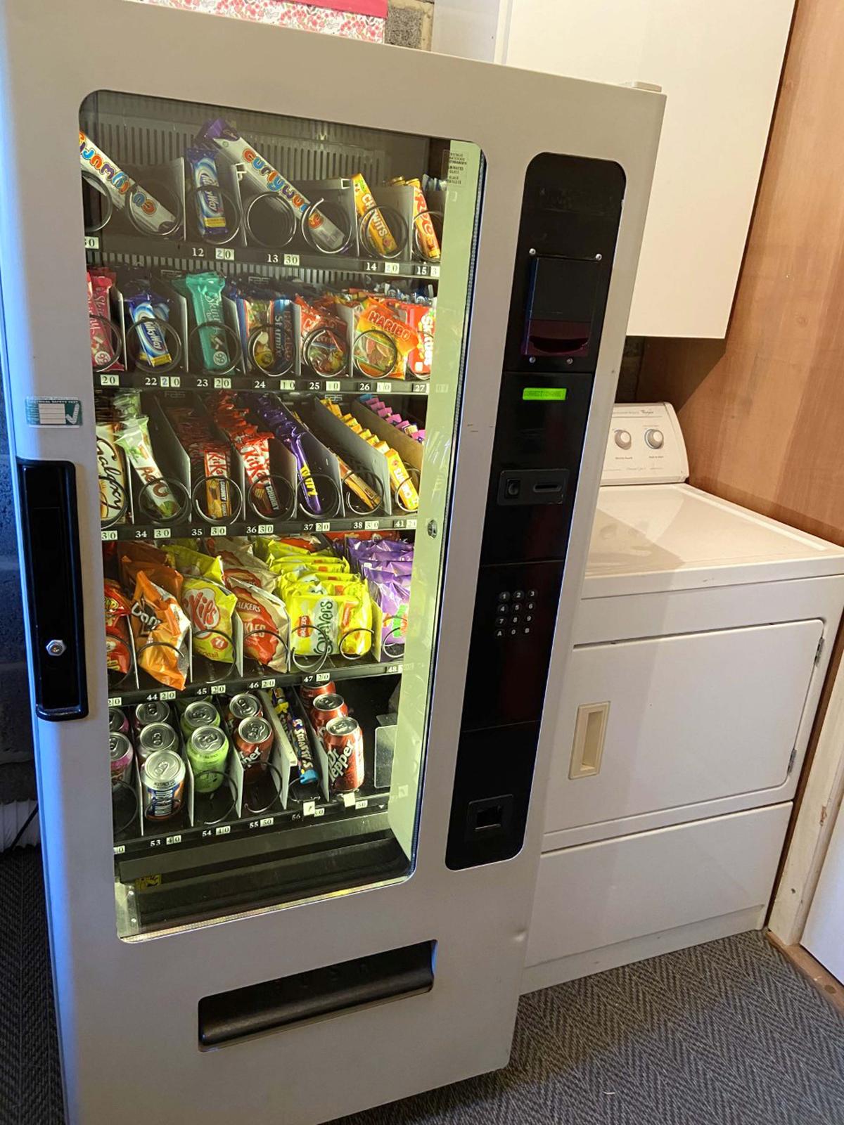 The vending machine Sarah Balsdon bought so her kids could pay for their own treats and snacks (Caters News)