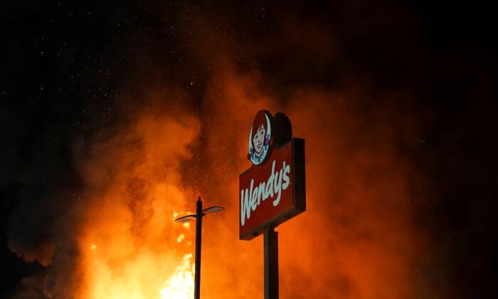 CNN Camera Crew Attacked While Filming Rioters Allegedly Burning Down Wendy’s