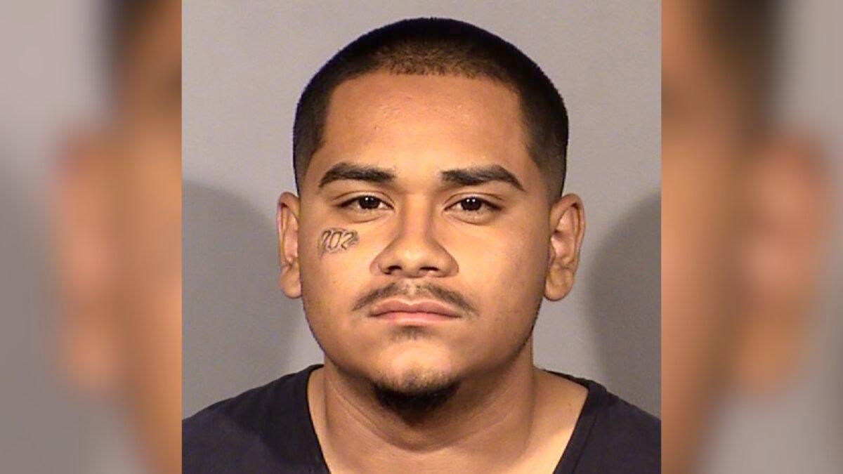 This booking photo provided by Las Vegas Metropolitan Police Department shows Edgar Samaniego, 20, of Las Vegas, following his arrest on June 2, 2020, in the shooting of Las Vegas Police Officer Shay Kellin Mikalonis on the Las Vegas Strip. (Clark County Detention Center/Las Vegas Metropolitan Police Department via AP)