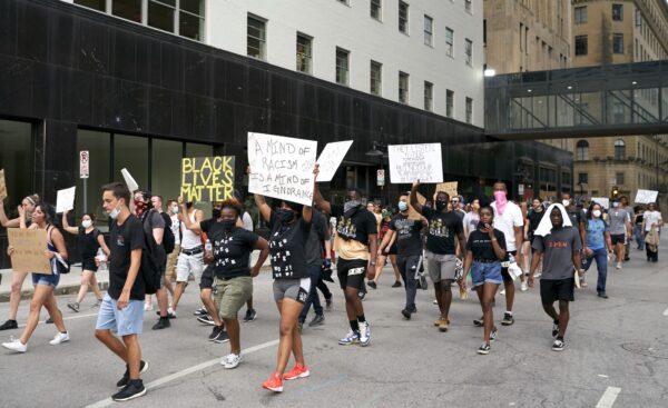 Demonstrators march during a protest in Dallas, Texas on June 6, 2020. (Cooper Neill/Getty Images)