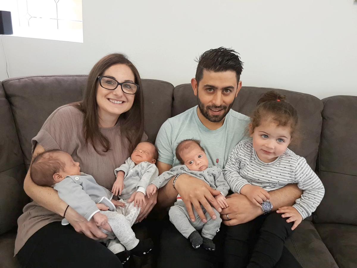 The identical triplets with their parents, Lina and Fabio, and older sister, Alba. (Caters News)