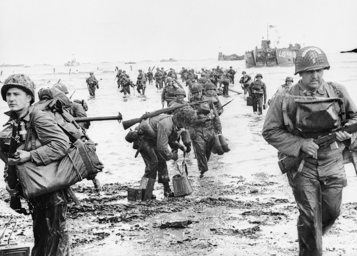 June 6, 1944: U.S. Assault Troops seen here landing on Omaha beach during the Invasion of Normandy. (Keystone/Getty Images)